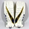 CCM Extreme Flex 4 - Used NCAA Pro Stock Senior Goalie Pads (White/Gold) 1 CCM Extreme Flex 4 - Used NCAA Pro Stock Senior Goalie Pads (White/Gold) -Hockey Stick Man Photo2023 05 24 121210PM