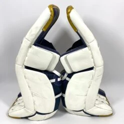 CCM Extreme Flex 5 - Used NCAA Pro Stock Goalie Pads (White/Blue/Gold) -Hockey Stick Man Photo2023 06 09 11503PM